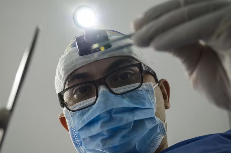 Useful Questions to Ask Before You Travel: A doctor in a clinic Doctor in clinic for Useful Questions to Ask Before You Travel - Best Way To Find Way To Cambridge: Private Microsuction Ear...
