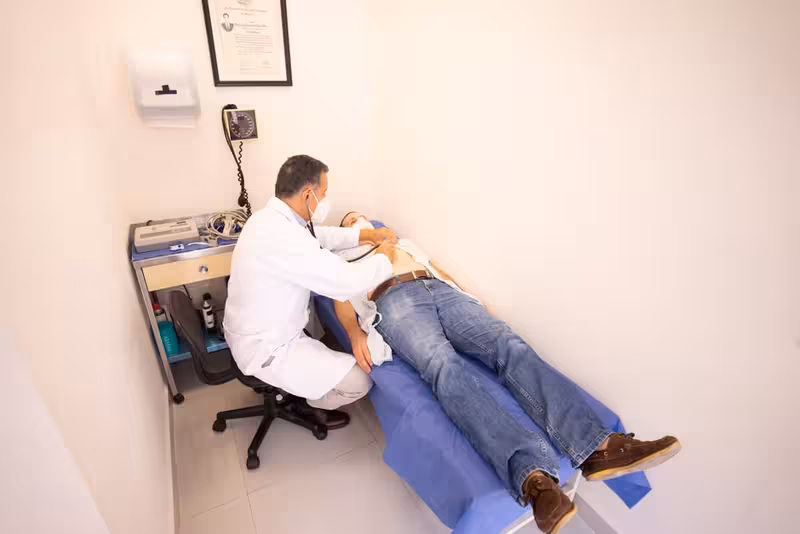 Microsuction Versus Ear Syringing: A doctor in a clinic Doctor in clinic for Microsuction Versus Ear Syringing - Best Way To Find Way To Cambridge: Private Microsuction Ear Wax Rem...