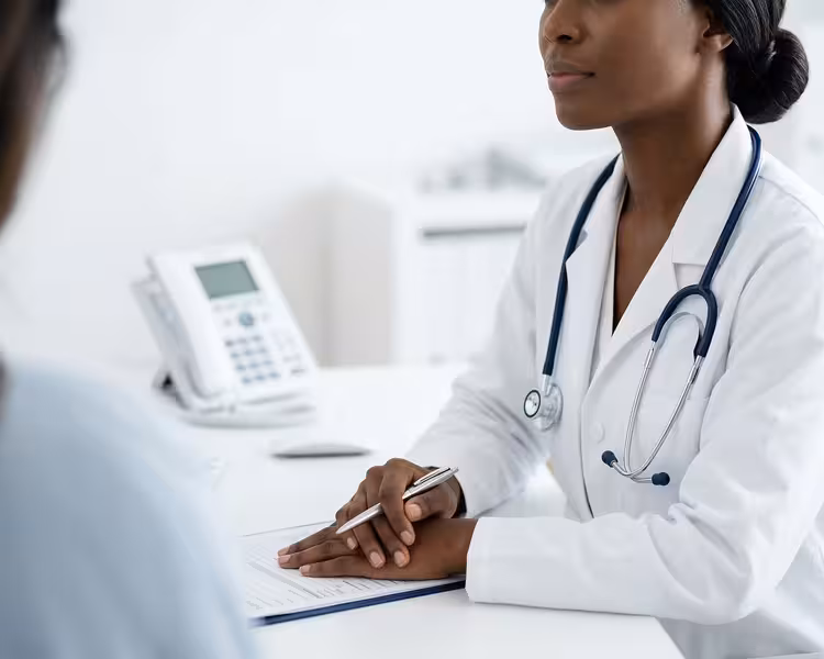 More Information: A doctor and patient during a consultation Doctor and patient consultation for More Information - Step By Step Map To Hastings: Private Microsuction Ear Wax Removal In...